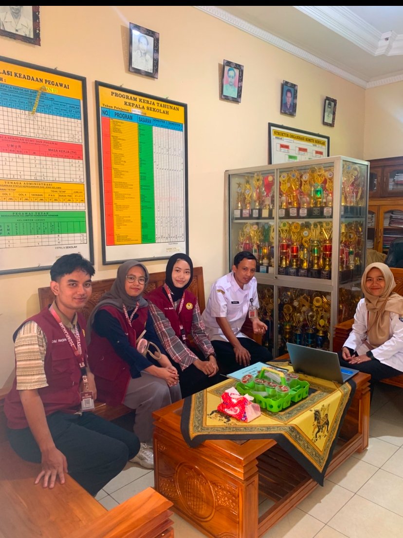 Koordinasi dengan pihak sekolah desa planjan