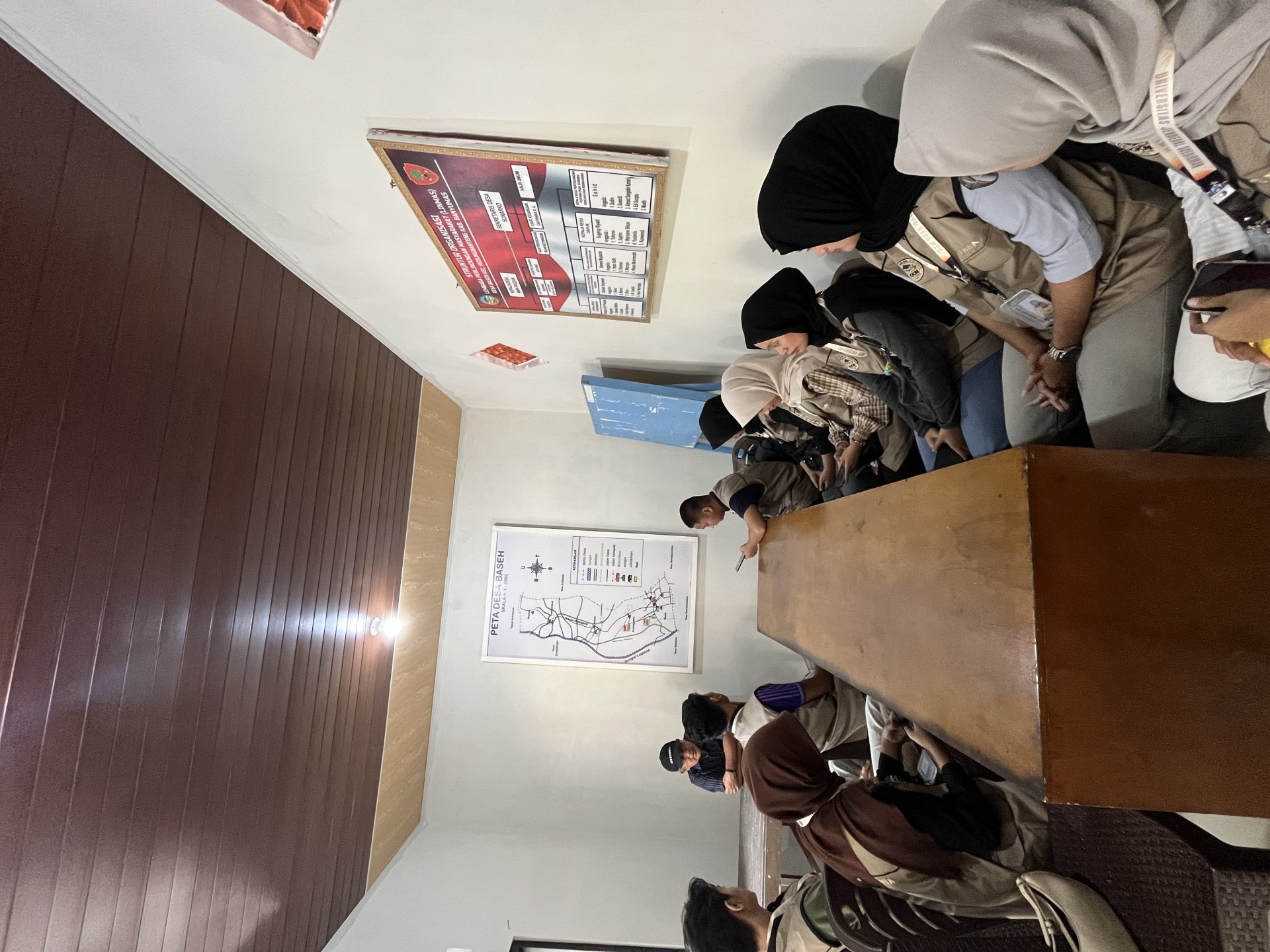 Rapat bersama Pemdes, pemasangan plang dan banner, dan Kunjungan ke KKN Kutaliman