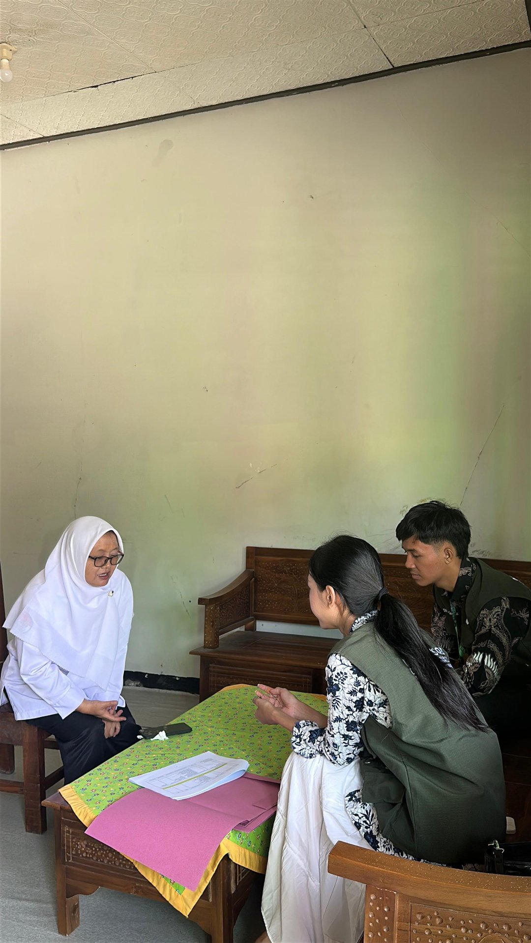 Kunjungan dan koordinasi ke sekolah MI