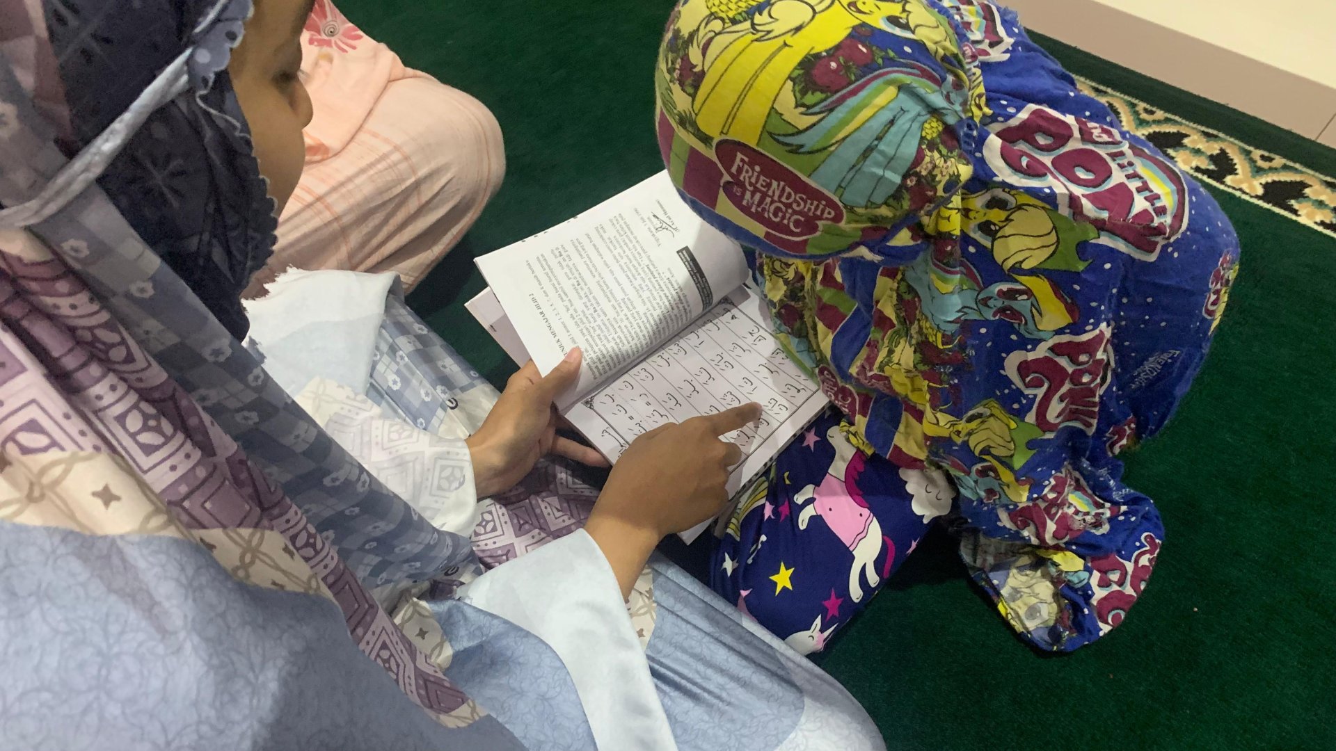 Mengajar ngaji di Musholla Nurul Huda