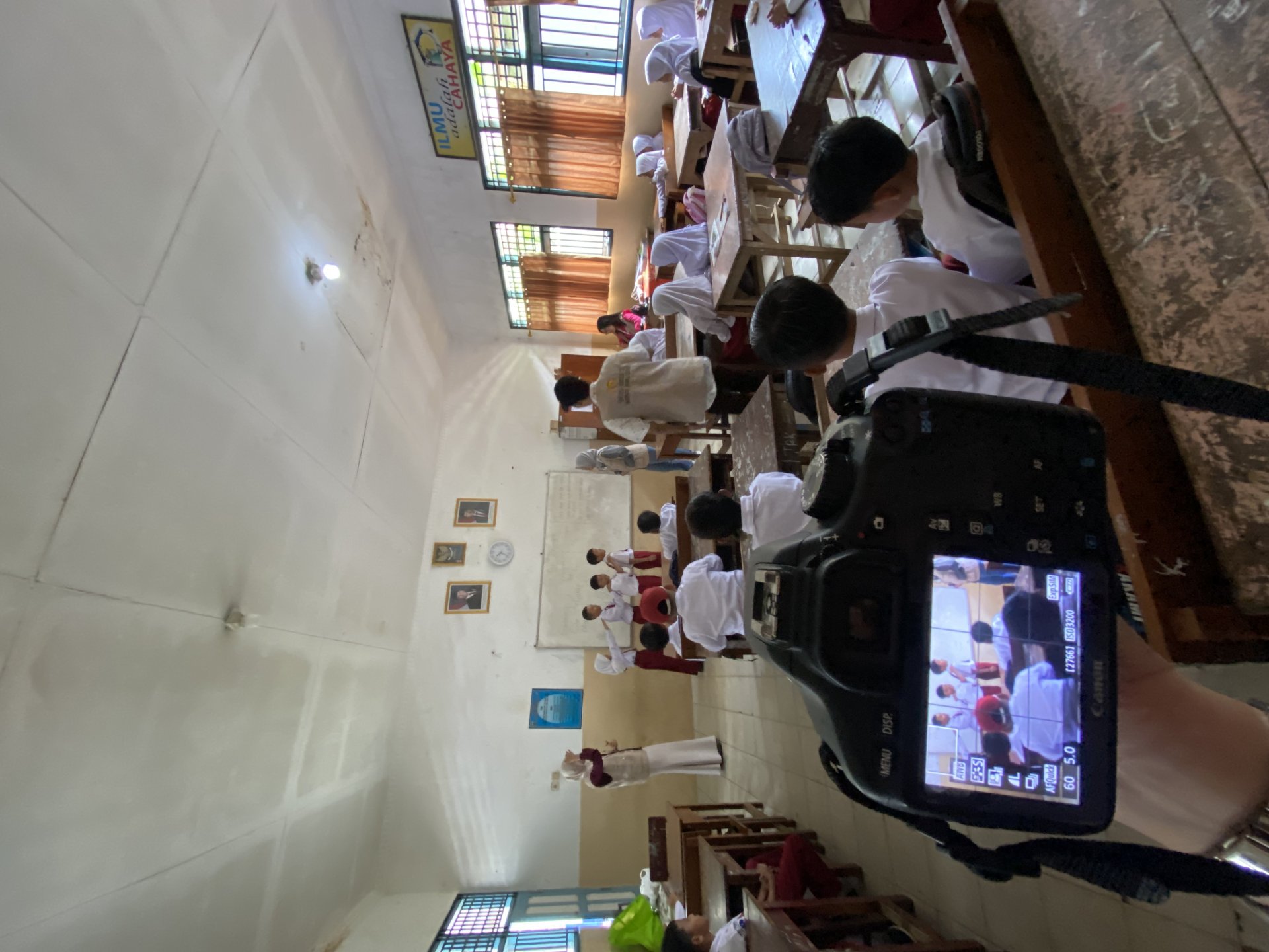 Melaksanakan program kerja pemerintahan desa dan juga sosialisasi ke SDa