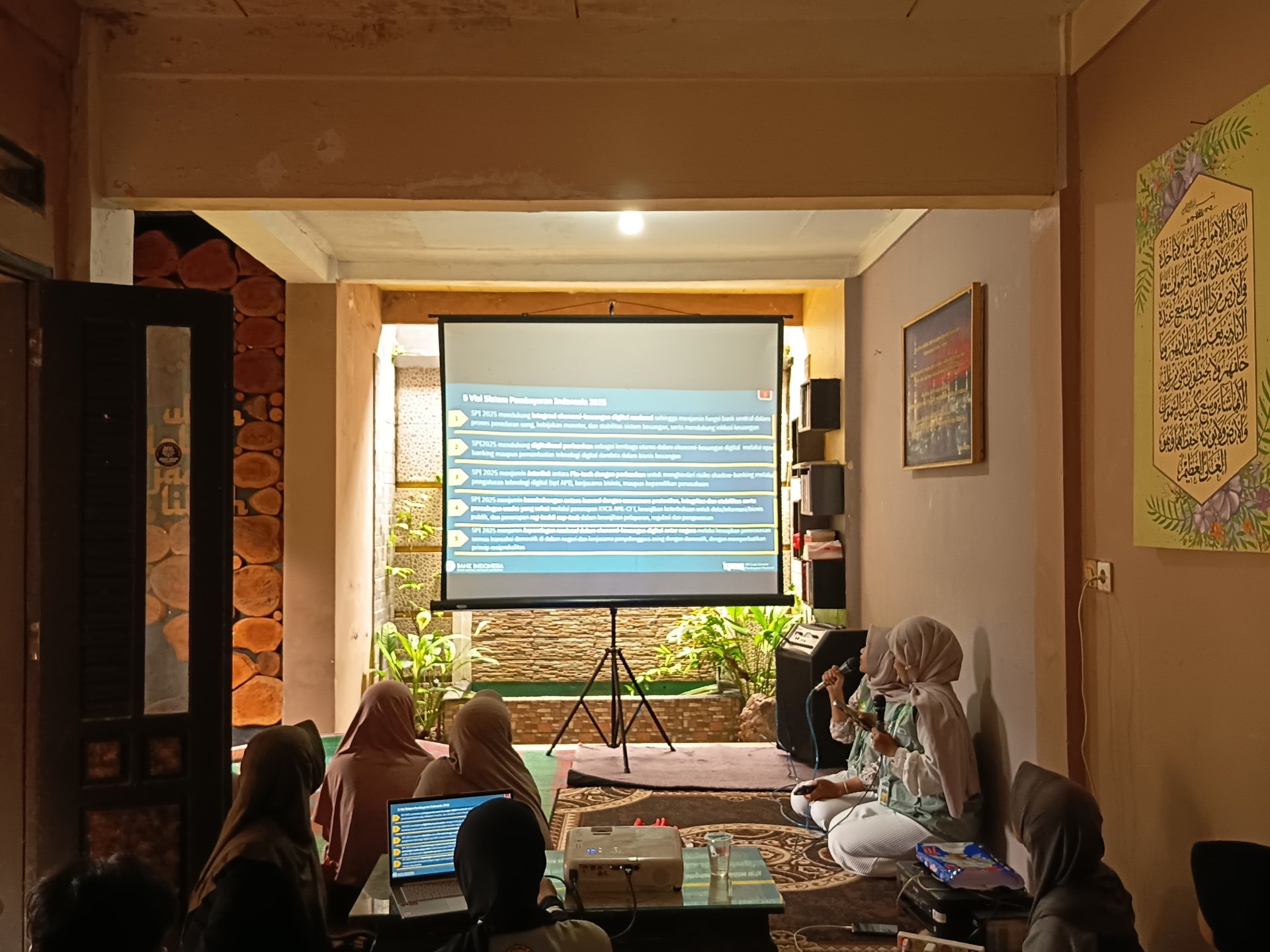 Mengikuti sosialisasi keuangan digital QRIS yang diadakan bidang ekonomi