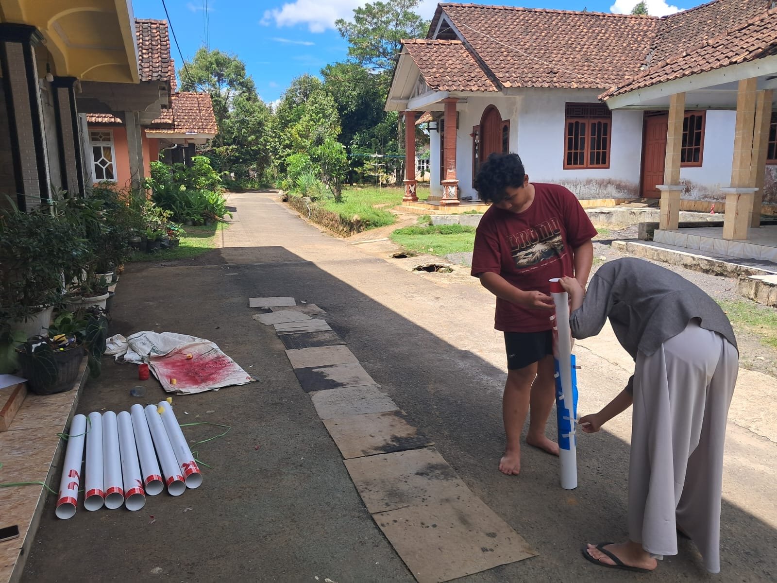 Melakukan plang desa