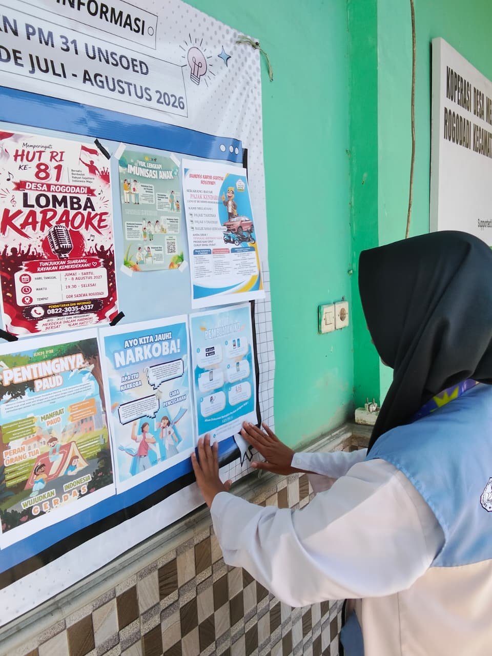 pelaksanaan pembaharuan papan informasi, serta pelepasan mahasiswa KKN